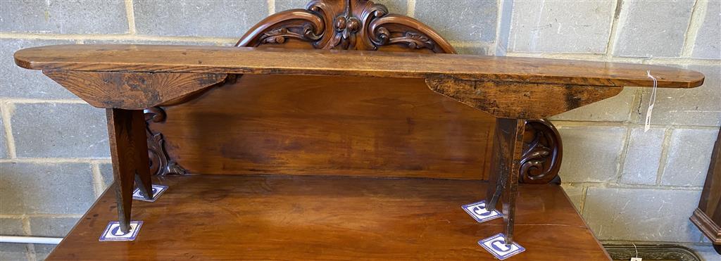 An 18th century elm bench seat, length 183cm, height 49cm